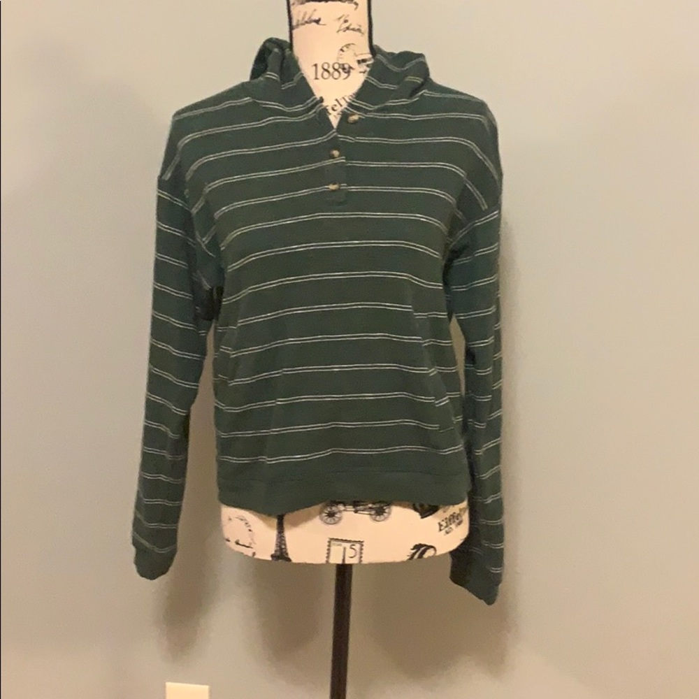 Green sweater.